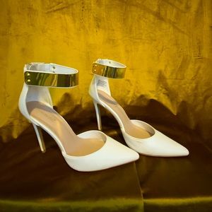 White heels with gold cuff